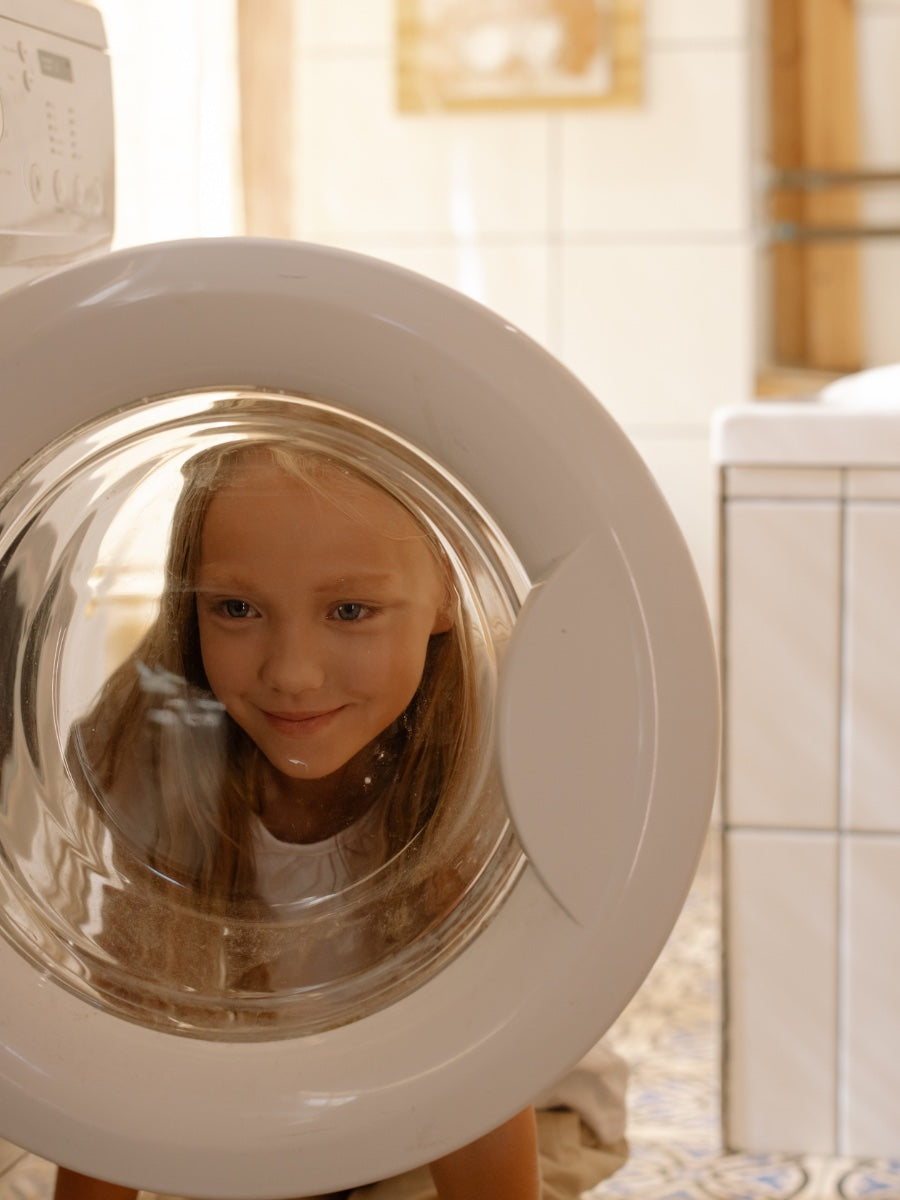 Peekaboo! The laundry is all clean using Purecise Clean detergent strips.