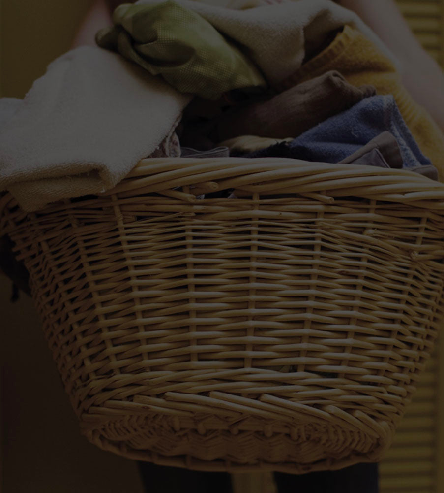 Basket of laundry full of clean laundry from Toss And Go by Purecise. Toss and Go laundry basket wash